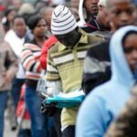 Unemployed Malawian youth applying for jobs
