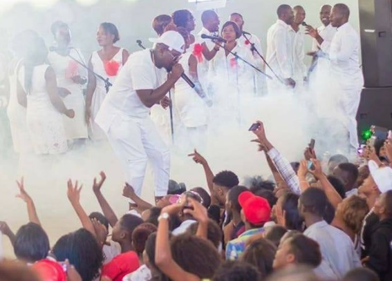 Gwamba-performing-in-Malawi-wearing-all-white