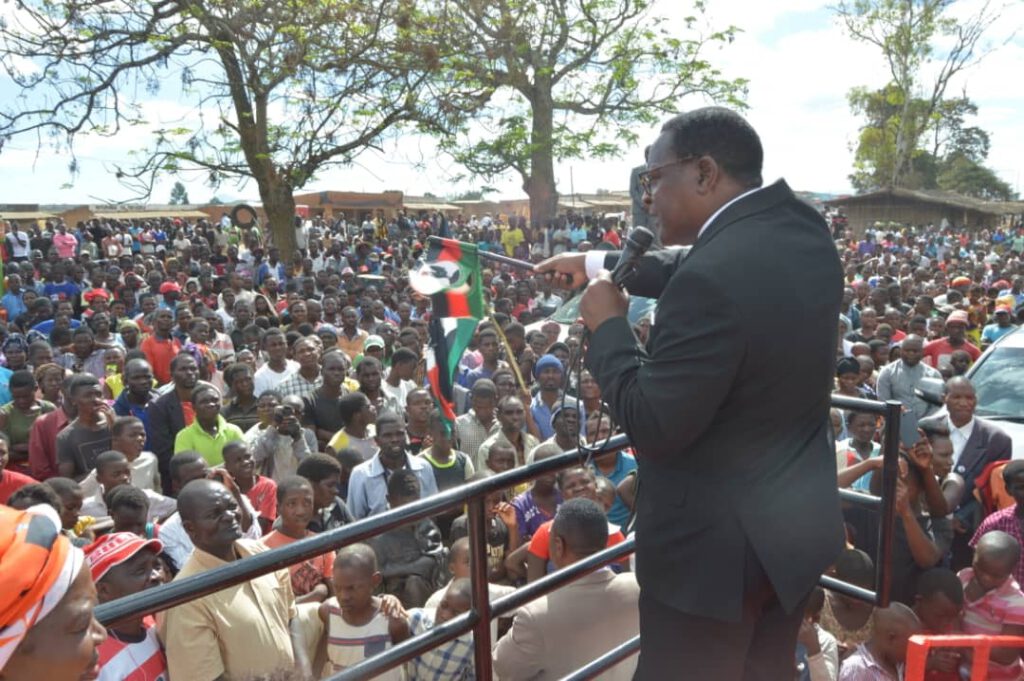 Lazarus Chakwera With Mcp Flag