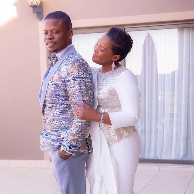 Mary Bushiri Holding Husband