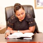 Mary Bushiri Reading Bible