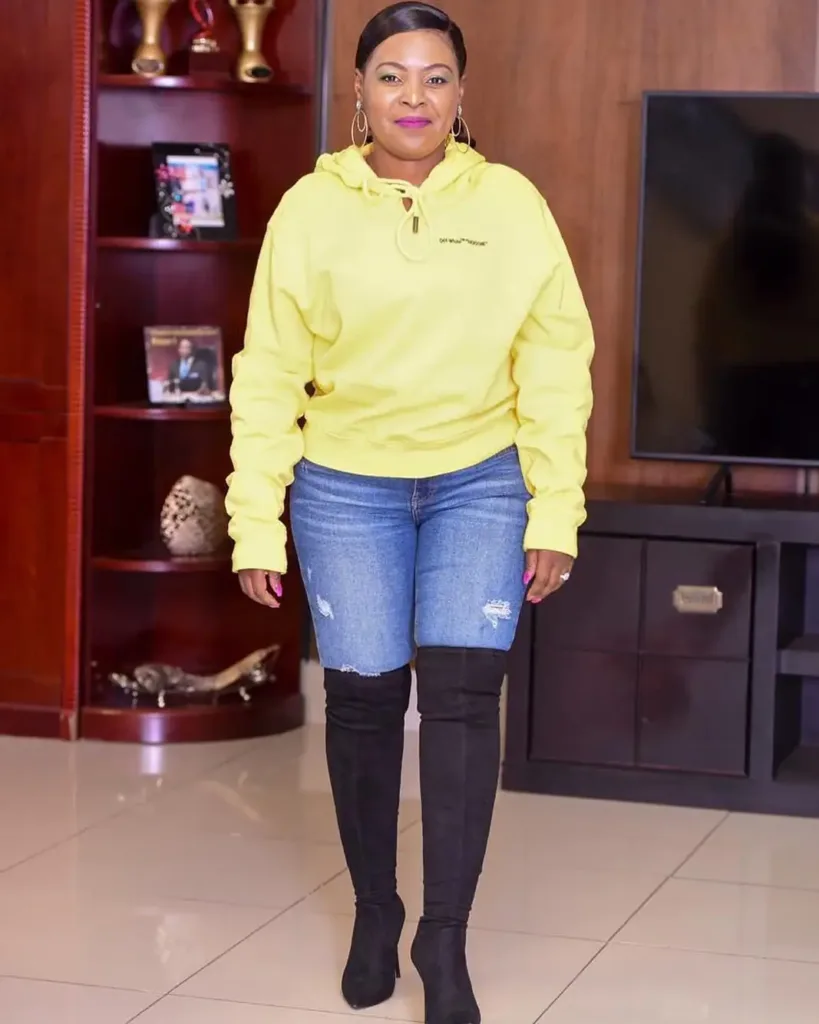 Mary Bushiri Wearing Black Boots