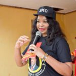 Mary Chilima Wearing Skc Hat