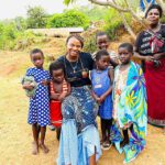 Mwai Kumwenda In Village With Kids