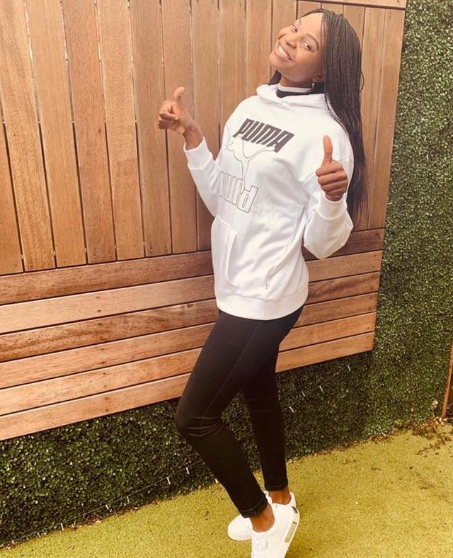 Mwai Kumwenda Thumbs Up With Puma Clothing