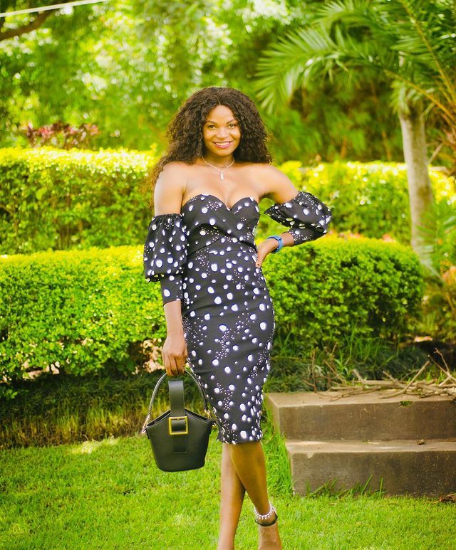 Mwai Kumwenda Wearing Black Dress With White Dots