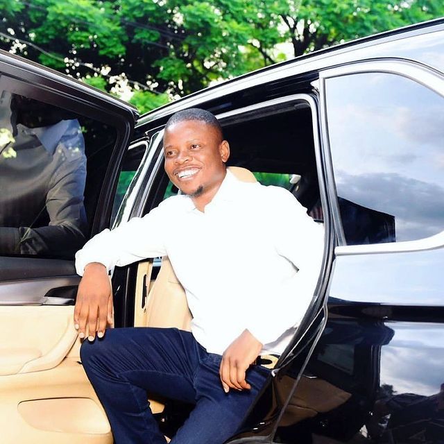 Shepherd Bushiri Smiling Outside Car