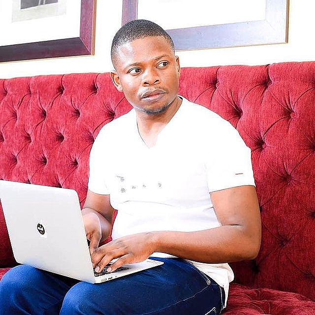 Shepherd Bushiri Using Macbook Laptop