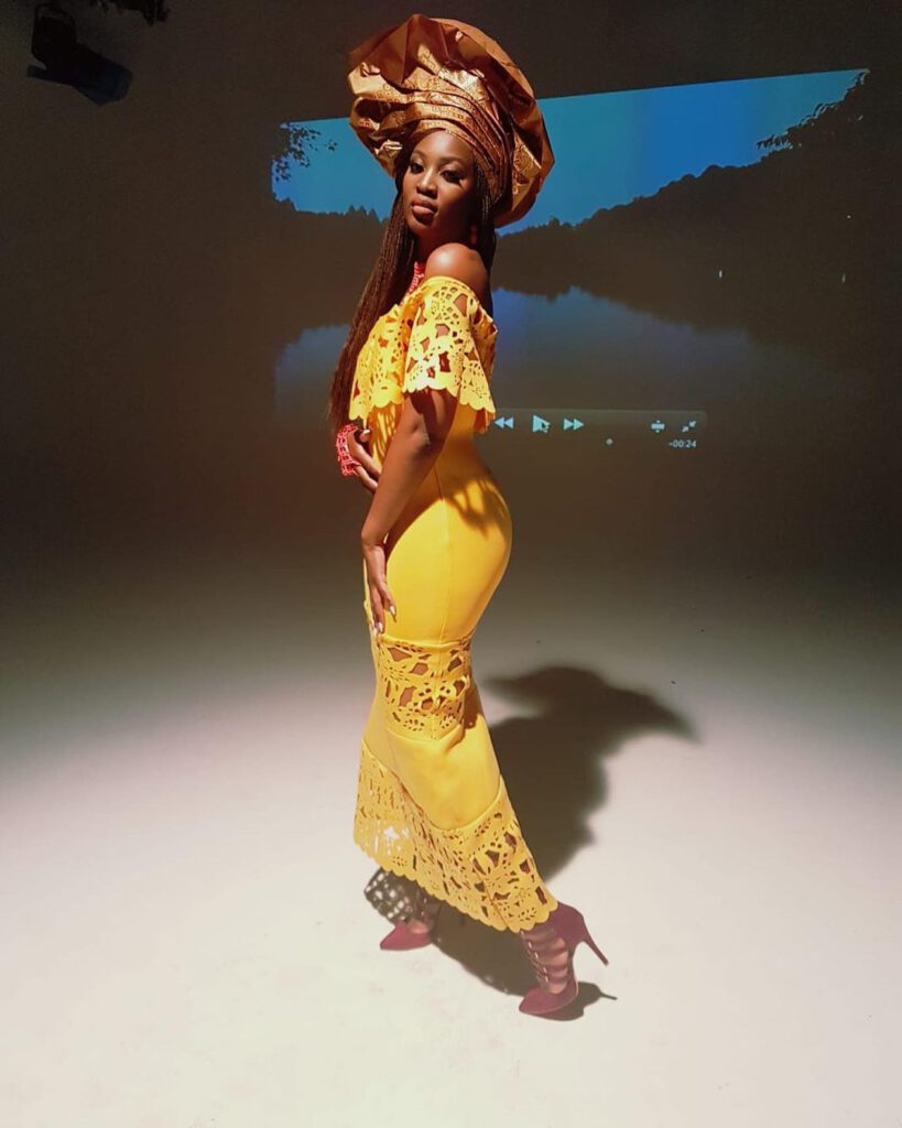 Zani Challe Wearing Yellow African Style Outfit