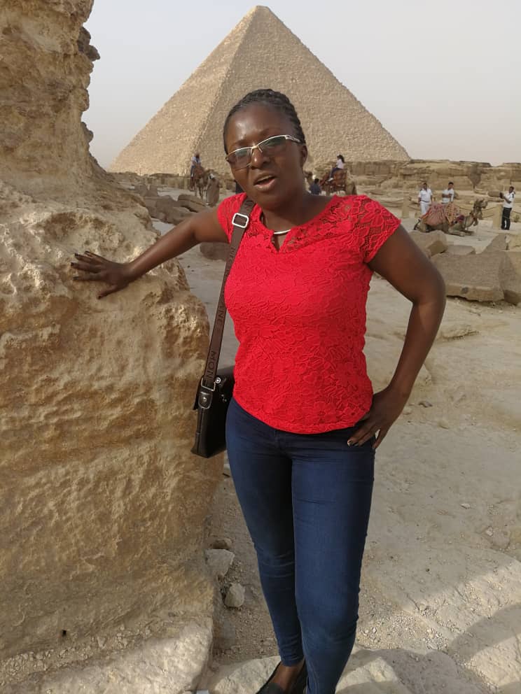 Martha In Egypt Wearing Red Shirt Blue Jeans