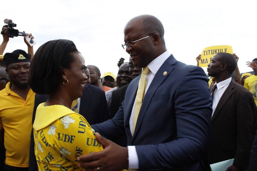 Atupele Smiling With Wife