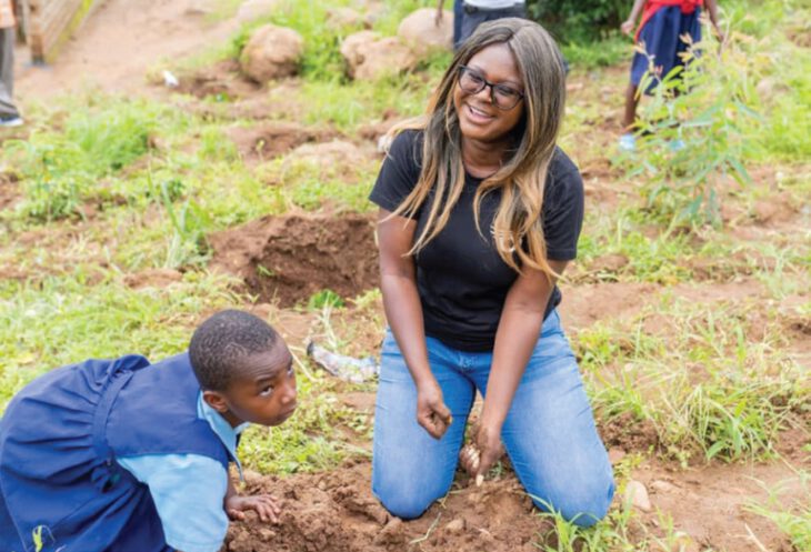 Firm says committed to reforestation, plants trees