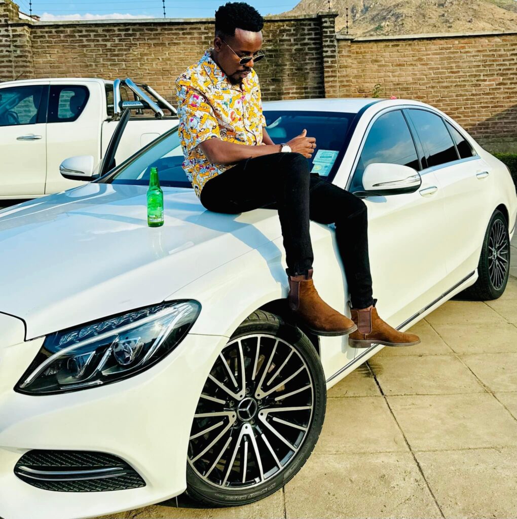 With His Beer And Benz Car