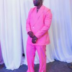 Wearing Pink Suit